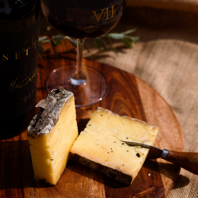 This cheese will transport you to the vineyards of Fratelli. Wrapped in Sangiovese leaves and matured for 6 - 12 months, our Cheddarg is a combination of two British styles, Cheddar & Cornish Yarg.