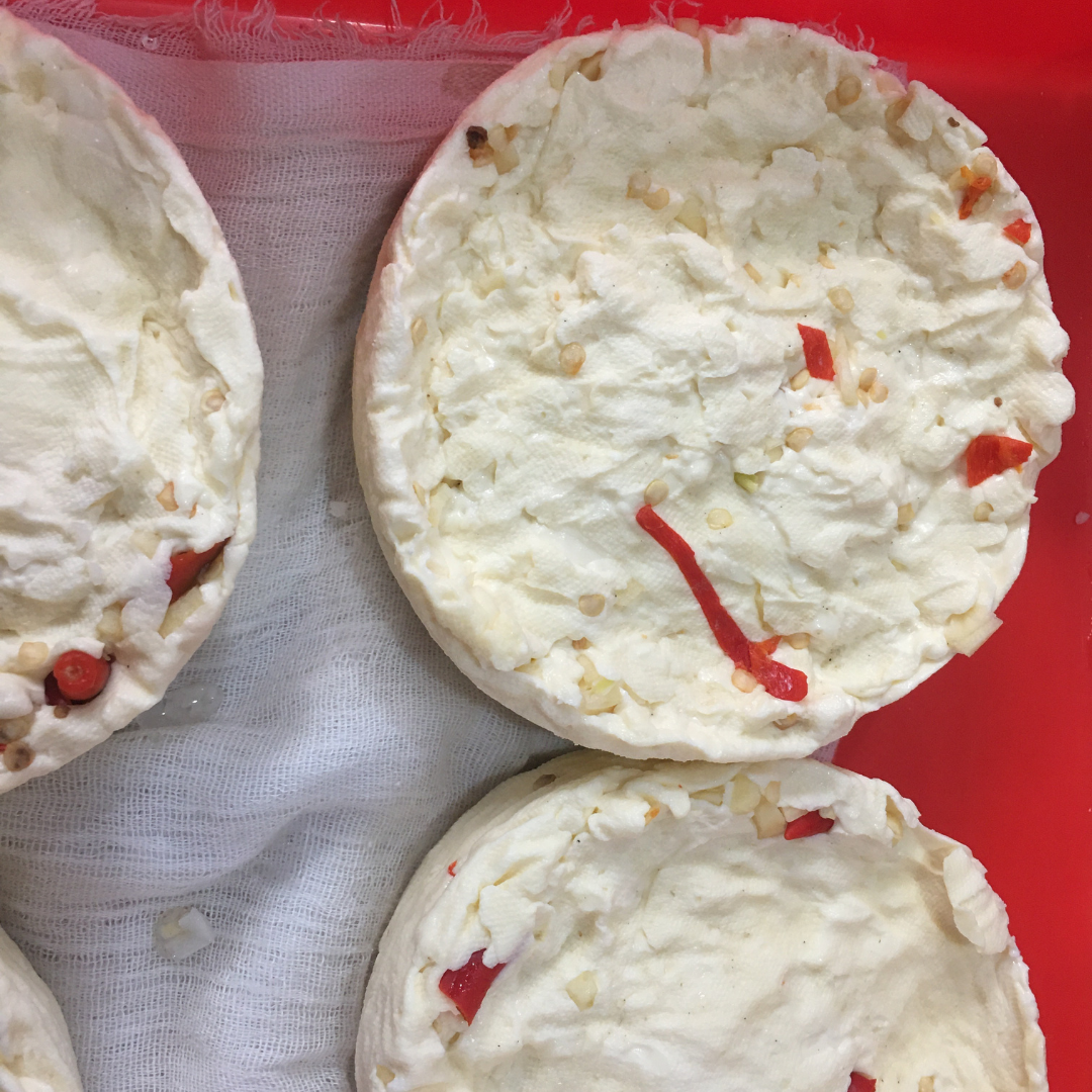 Buffalo Milk Feta style cheese infused with red Chillis and Garlic, creamy with a hint of spice.