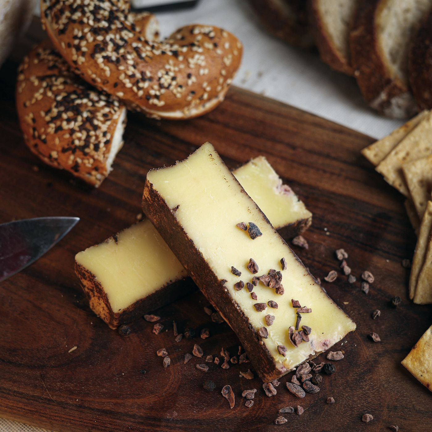 Käse Blackjack is a young semi-hard cheese aged for about 3 months, crusted with a mixture of coffee beans, cacao nibs & peppercorns and aged for another 2-3 weeks.
