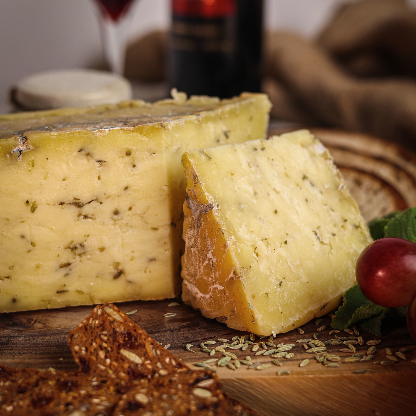 Käse Saunf Cheese is a semi-hard milled curd cheese infused with organic fennel seeds and aged for 6-8 months.