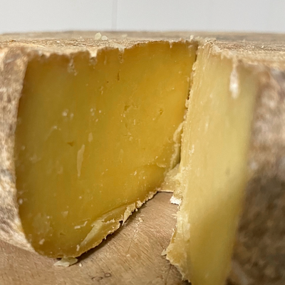 Mild, semi-firm cow's milk cheese with a beige interior and a thick brownish-grey rind. Inspired from the popular alpine style cheese, this has layered complex flavours.