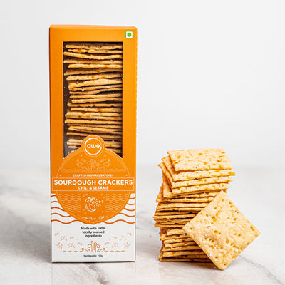 Infused with the sharp & hot profile of chili, paired with the mild, sweet & nutty crunch of sesame, these whole-wheat sourdough crackers are a gut friendly munchy snack.